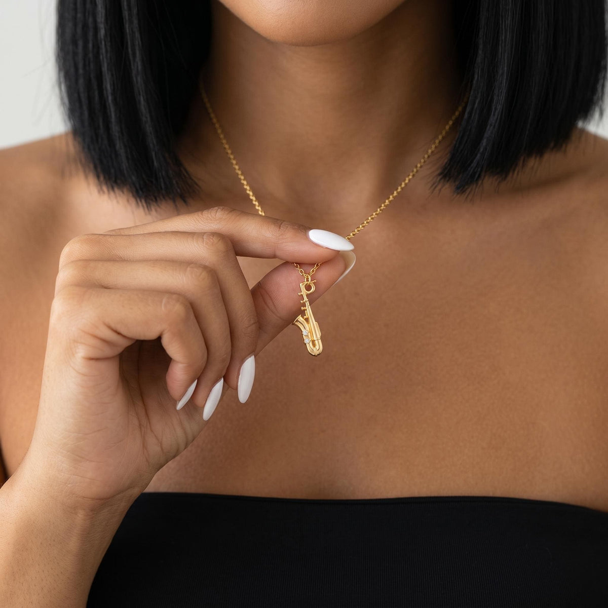 Gold saxophone necklace, minimalist music pendant, jazz lover gift, dainty musician jewelry, instrument charm necklace for women men