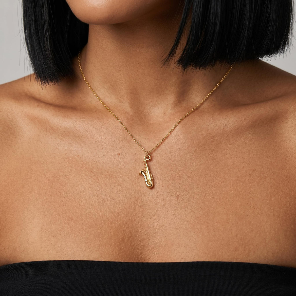 Gold saxophone necklace, minimalist music pendant, jazz lover gift, dainty musician jewelry, instrument charm necklace for women men